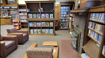 mural depicting a child reading and the inscription Reuben C. Chadbourn Children's Library